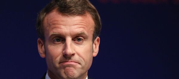 French President Emmanuel Macron reacts as he delivers a speech during the Global forum on Artificial Intelligence (AI) for Humanity (GFAIH) at the Institut de France on October 30, 2019, in Paris. French President Emmanuel Macron reacts as he delivers a speech during the Global forum on Artificial Intelligence (AI) for Humanity (GFAIH) at the Institut de France on October 30, 2019, in Paris. - Sputnik Afrique