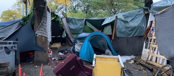 L'évacuation du camp de migrants de la Porte de la Chapelle - Sputnik Afrique