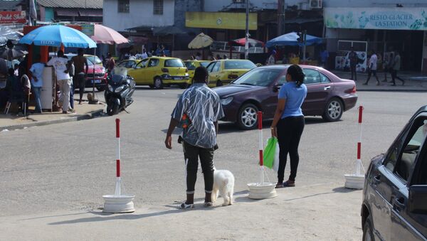 Une rue passante à Abidjan. - Sputnik Afrique