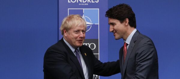 Boris Johnson et Justin Trudeau au sommet de l'Otan - Sputnik Afrique