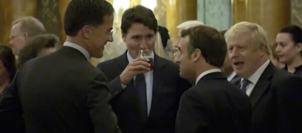 Trudeau et Macron - Sputnik Afrique