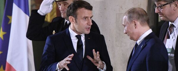 Emmanuel Macron et Vladimir Poutine à Paris, lors du sommet au format Normandie (9 décembre 2019) Emmanuel Macron et Vladimir Poutine à Paris, lors du sommet au format Normandie (9 décembre 2019) - Sputnik Afrique