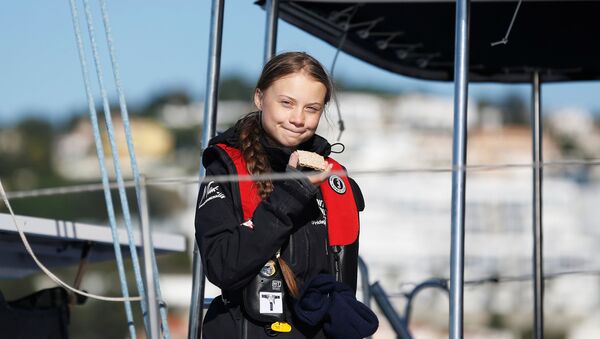 Climate change activist Greta Thunberg arrives aboard the yacht La Vagabonde at Santo Amaro port in Lisbon, Portugal December 3, 2019 - Sputnik Afrique