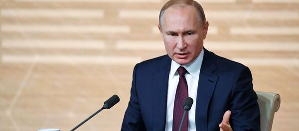 Vladimir Poutine pendant sa conférence de presse annuelle Vladimir Poutine pendant sa conférence de presse annuelle - Sputnik Afrique