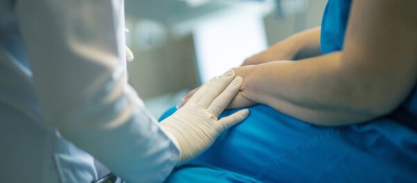 Un docteur et un patient, image d'illustration - Sputnik Afrique