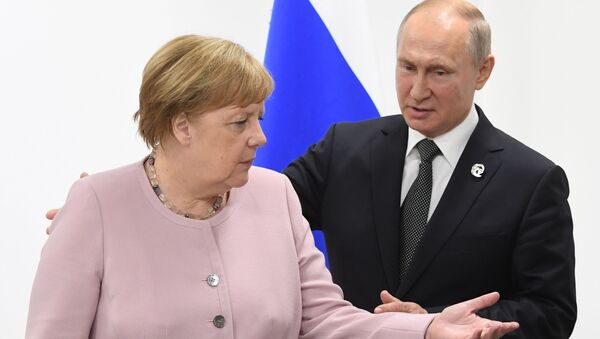 Angela Merkel et Vladimir Poutine (photo d'archives) - Sputnik Afrique