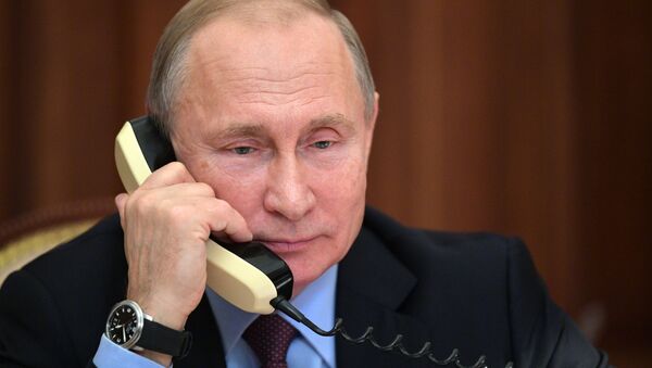 Vladimir Poutine lors d'un entretien téléphonique - Sputnik Afrique