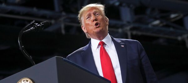 Presidente dos EUA, Donald Trump, fala durante comício de campanha em Battle Creek, Michigan, EUA, 18 de dezembro de 2019 Presidente dos EUA, Donald Trump, fala durante comício de campanha em Battle Creek, Michigan, EUA, 18 de dezembro de 2019 - Sputnik Afrique