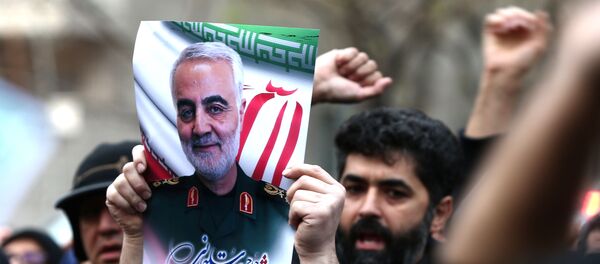Iranian demonstrators chant slogans during a protest against the assassination of the Iranian Major-General Qassem Soleimani, head of the elite Quds Force, and Iraqi militia commander Abu Mahdi al-Muhandis, who were killed in an air strike at Baghdad airport, in front of United Nation office in Tehran, Iran January 3, 2020. Iranian demonstrators chant slogans during a protest against the assassination of the Iranian Major-General Qassem Soleimani, head of the elite Quds Force, and Iraqi militia commander Abu Mahdi al-Muhandis, who were killed in an air strike at Baghdad airport, in front of United Nation office in Tehran, Iran January 3, 2020. - Sputnik Afrique