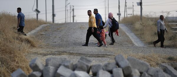 Des personnes en Syrie - Sputnik Afrique