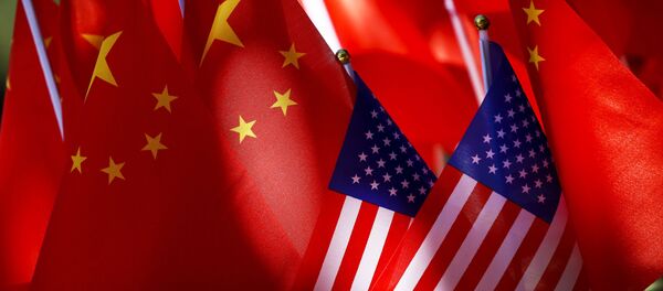 Drapeaux des USA et de la Chine  - Sputnik Afrique