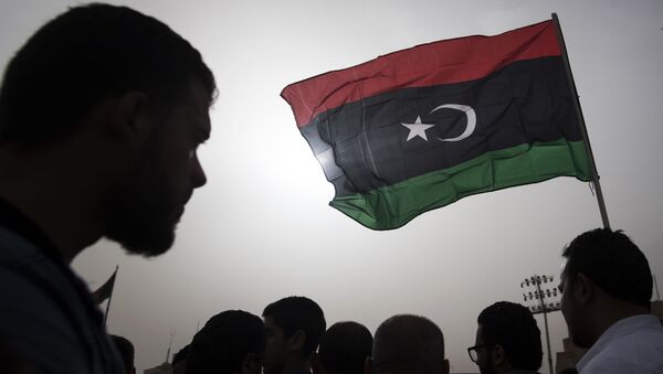 Libyans gather during the funeral of fighters loyal to the Government of National Accord (GNA) in the capital Tripoli, on April 24, 2019 - Sputnik Afrique