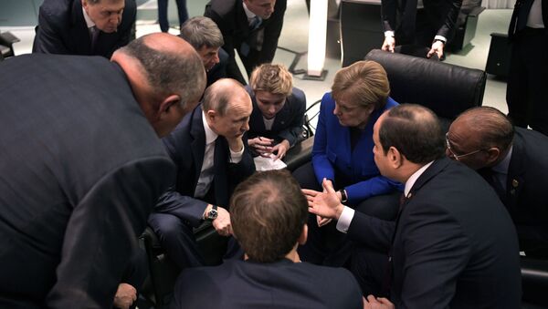 Поездка президента РФ В. Путина в Берлин для участия в Международной конференции по Ливии - Sputnik Afrique
