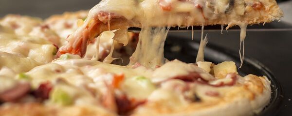 Une pizza - Sputnik Afrique