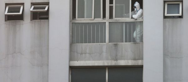 L'employé d'un hôpital à Wuhan L'employé d'un hôpital à Wuhan - Sputnik Afrique