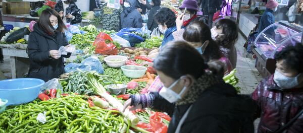 Un marché de Wuhan - Sputnik Afrique