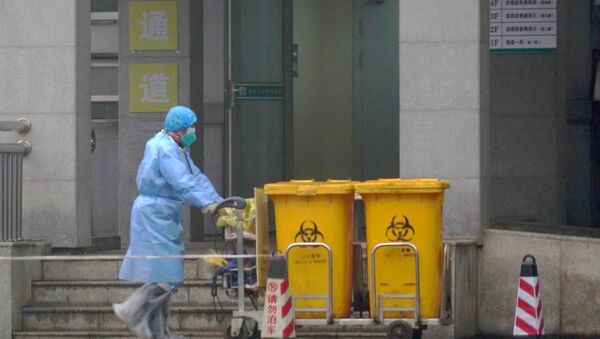 L'employé d'un hôpital à Wuhan pendant la pandémie de Covid-19 (archive photo) - Sputnik Afrique