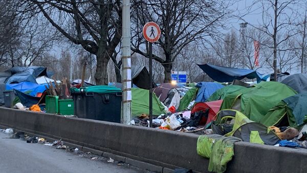Évacuation d’un important camp de migrants à la porte d'Aubervilliers à Paris, 28.01.2020 - Sputnik Afrique