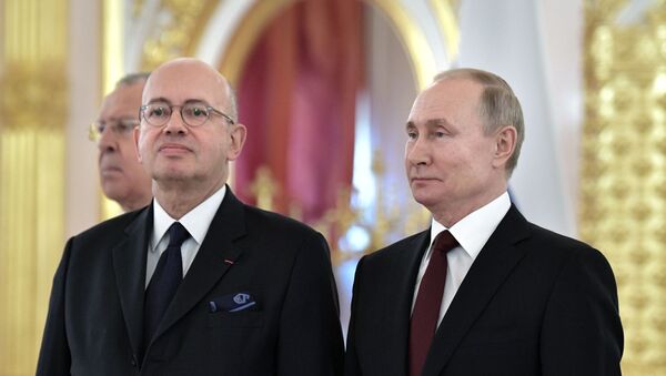 Pierre Lévy (à gauche) et Vladimir Poutine - Sputnik Afrique