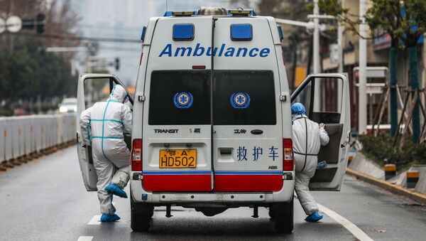 Ambulancia en Wuhan, China - Sputnik Afrique