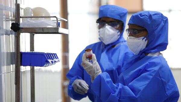 Medical staff with protective clothing are seen inside a ward specialised in receiving any person who may have been infected with coronavirus, at the Rajiv Ghandhi Government General hospital in Chennai, India, January 29, 2020. - Sputnik Afrique