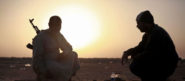 Des combattants de l'opposition à la périphérie de la ville libyenne d'Ajdabiya, en 2011 (photo d'archives) - Sputnik Afrique