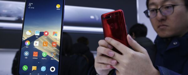 Un smartphone Xiaomi - Sputnik Afrique