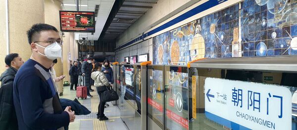 Une station de métro à Pékin après l'annonce de l'épidémie du coronavirus 2019-nCoV (archive photo) Une station de métro à Pékin après l'annonce de l'épidémie du coronavirus 2019-nCoV (archive photo) - Sputnik Afrique