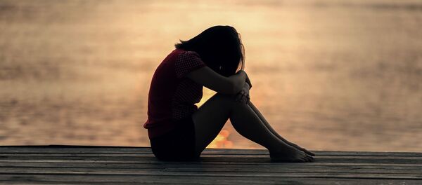 Une femme triste - Sputnik Afrique