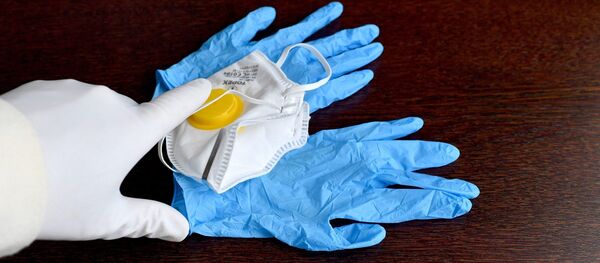 Des gants et un masque de protection - Sputnik Afrique