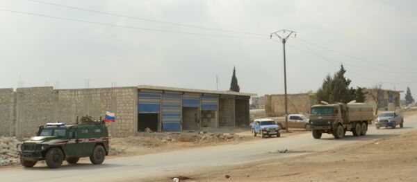 Patrouille russe à Alep - Sputnik Afrique