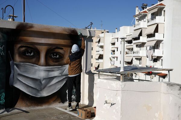 Le Covid-19 vu par les artistes: graffitis dans différentes villes du monde

 - Sputnik Afrique