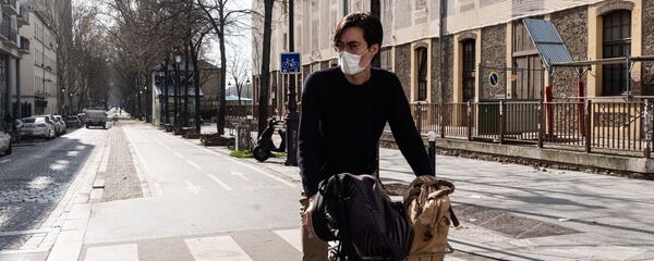 Une rue de Paris pendant le confinement sanitaire  - Sputnik Afrique