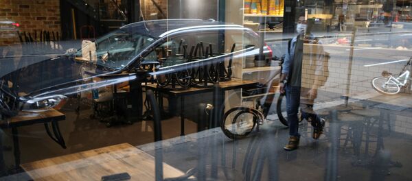 Un homme avec un masque en Australie, le 24 mars 2020 - Sputnik Afrique