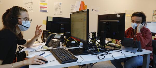Le centre d'appels Covidom à Paris, mis en place dans le cadre de la lutte contre le Covid-19. - Sputnik Afrique