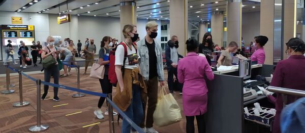 Un aéroport indonésien pendant l'épidémie de coronavirus - Sputnik Afrique