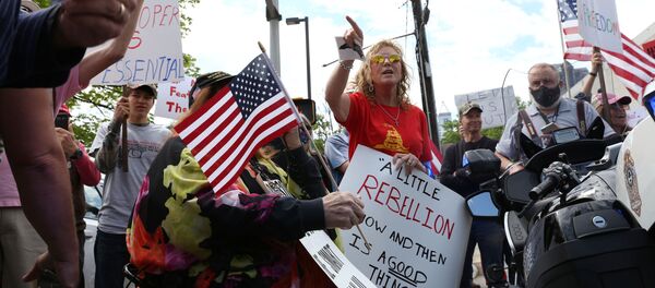 Des manifestants contre le confinement à Raleigh, en Caroline du Nord (États-Unis). - Sputnik Afrique