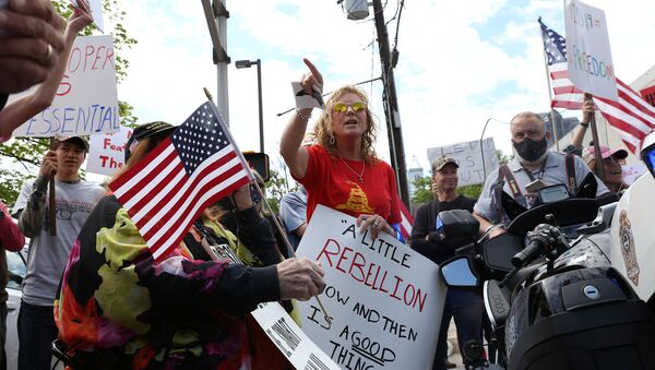 Des manifestants contre le confinement à Raleigh, en Caroline du Nord (États-Unis). - Sputnik Afrique
