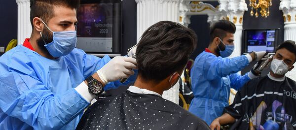 Un salon de coiffure en Irak, pendant la pandémie de coronavirus. - Sputnik Afrique
