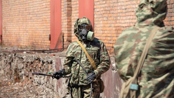 Des militaires désinfectent les rues à Vladikavkaz - Sputnik Afrique