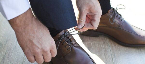 Des chaussures d'un homme - Sputnik Afrique