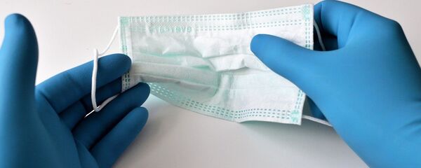 Un masque et des gants - Sputnik Afrique