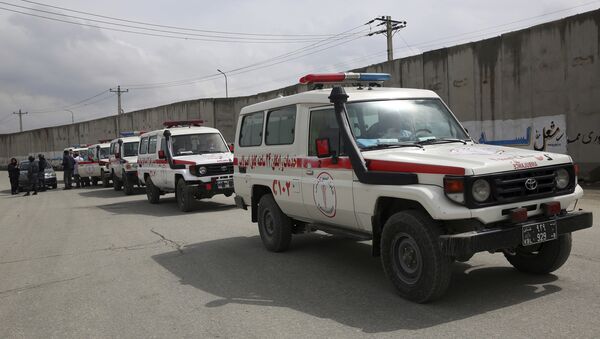 Ambulances wait near the site of an attack in Kabul, Afghanistan, Wednesday, March 25, 2020 - Sputnik Afrique