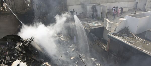 Un avion de ligne de la compagnie Pakistan International Airlines s’est écrasé près de Karachi, 22 mai 2020 - Sputnik Afrique