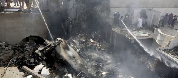 Un avion de ligne de la compagnie Pakistan International Airlines s’est écrasé près de Karachi, 22 mai 2020 - Sputnik Afrique