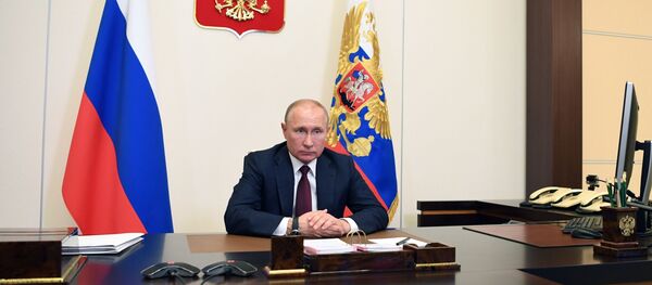 Vladimir Poutine lors d'une visioconférence - Sputnik Afrique