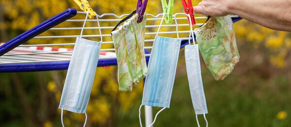 Des masques - Sputnik Afrique