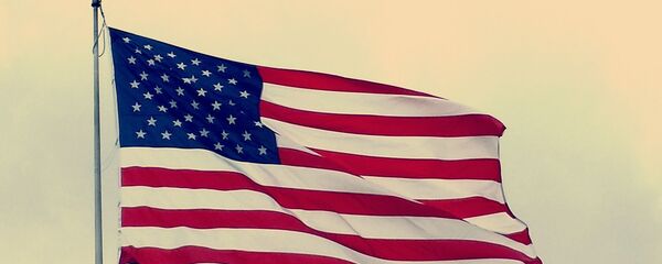 Un drapeau américain - Sputnik Afrique