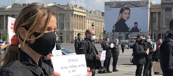 Le réel sous les yeux du glamour. Protestation des précaires de l’hôtellerie-restauration à Paris, 10 juin 2020 Le réel sous les yeux du glamour. Protestation des précaires de l’hôtellerie-restauration à Paris, 10 juin 2020 - Sputnik Afrique