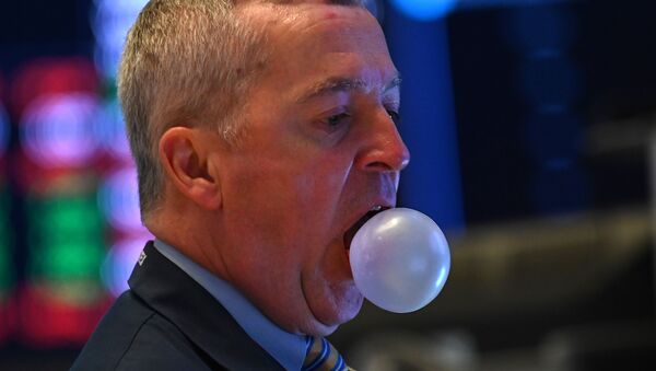 Un trader mâchant un chewing-gum lors de l’ouverture de la Bourse de New York à Wall Street. - Sputnik Afrique